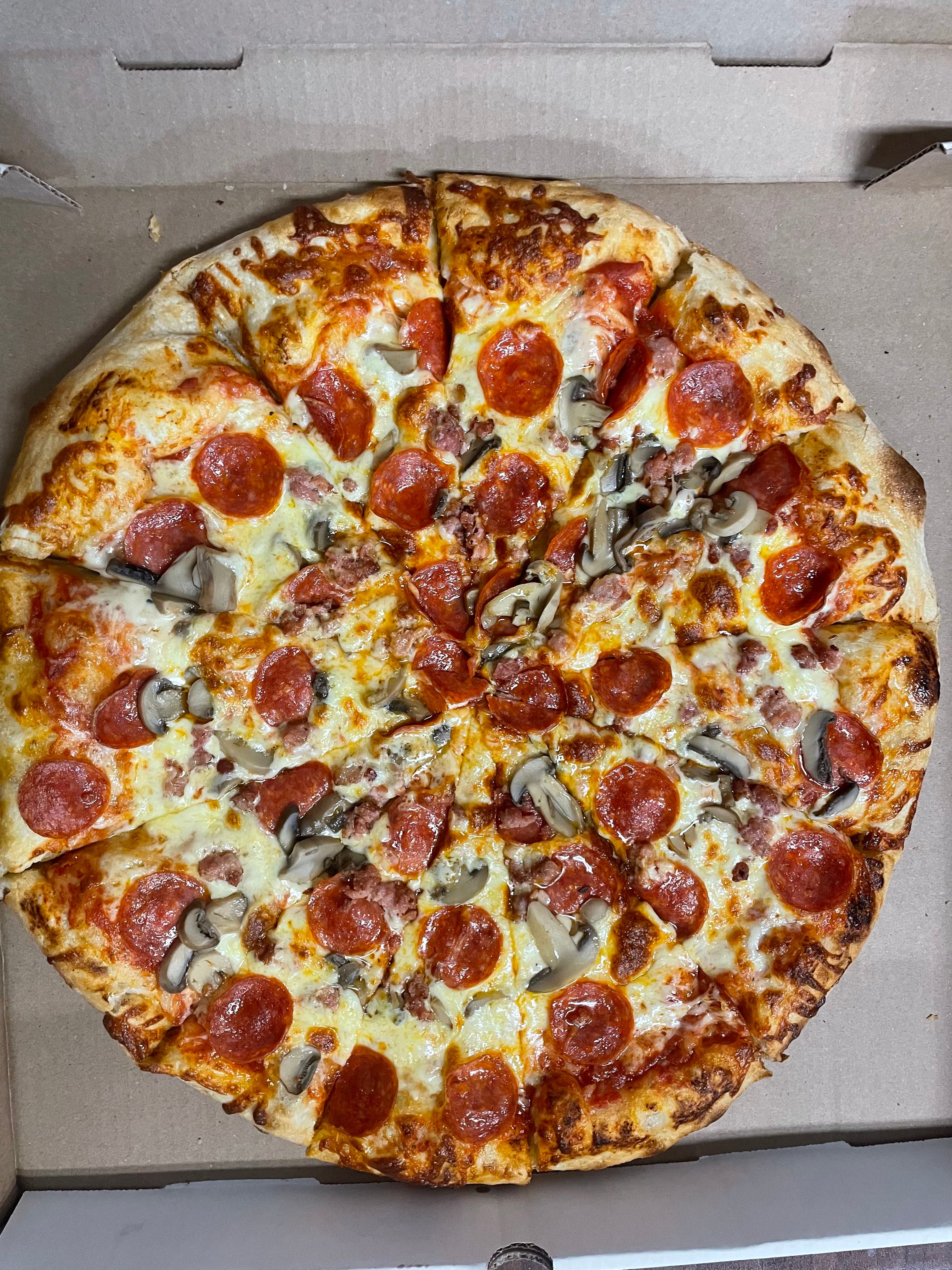 New York-style pizza at Ambrose Pizza & Wings